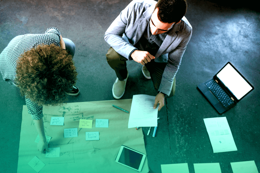 Coworkers collaborating during a design meeting
