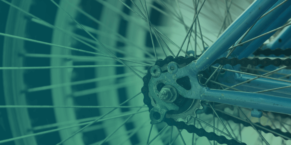 Up close image of the spokes of a bike wheel