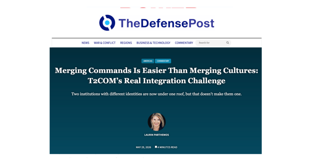 A screenshot of The Defense Post commentary article titled "Merging Commands Is Easier Than Merging Cultures: T2COM’s Real Integration Challenge" by Laurin Parthemos